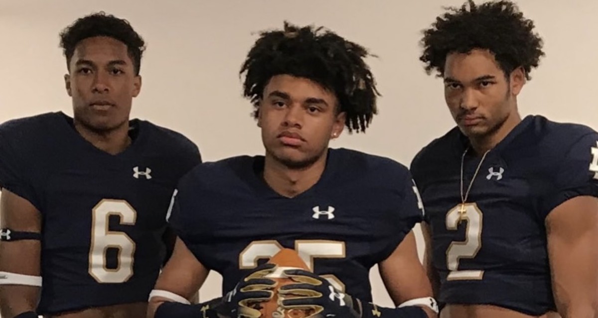 Kasen Kinchen, middle, has transferred from the UW to WSU.