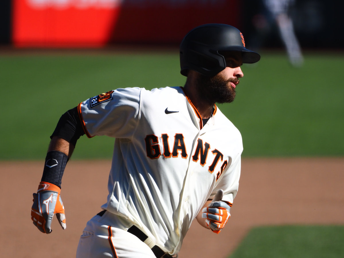 Former Longhorn Brandon Belt gets some help from the 'Ballot