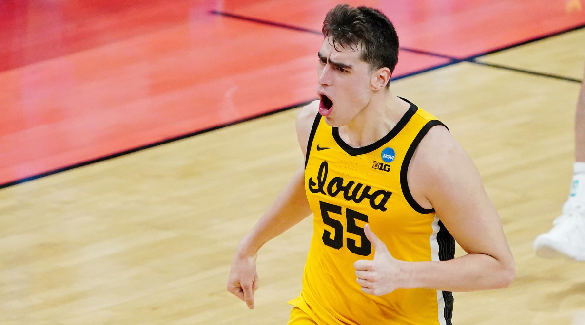 Mar 22, 2021; Indianapolis, Indiana, USA; Iowa Hawkeyes center Luka Garza (55) reacts after a play against the Oregon Ducks during the first half in the second round of the 2021 NCAA Tournament at Bankers Life Fieldhouse.