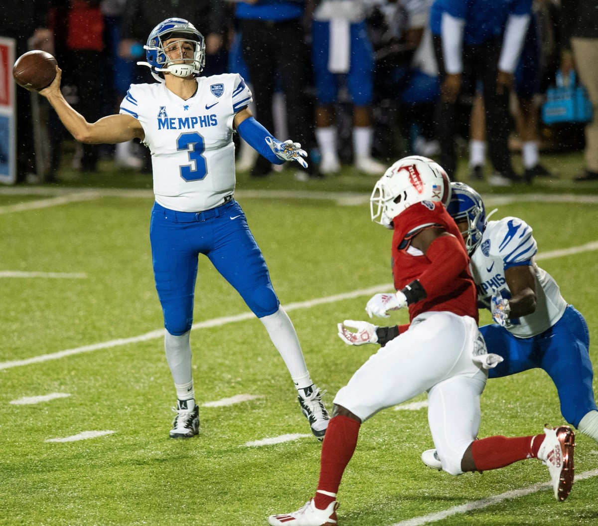 Memphis quarterback Brady White (3) throws a touchdown pass early against Florida Atlantic in the Montgomery Bowl held at Cramton Bowl in Montgomery, Ala., on Wednesday December 23, 2020.