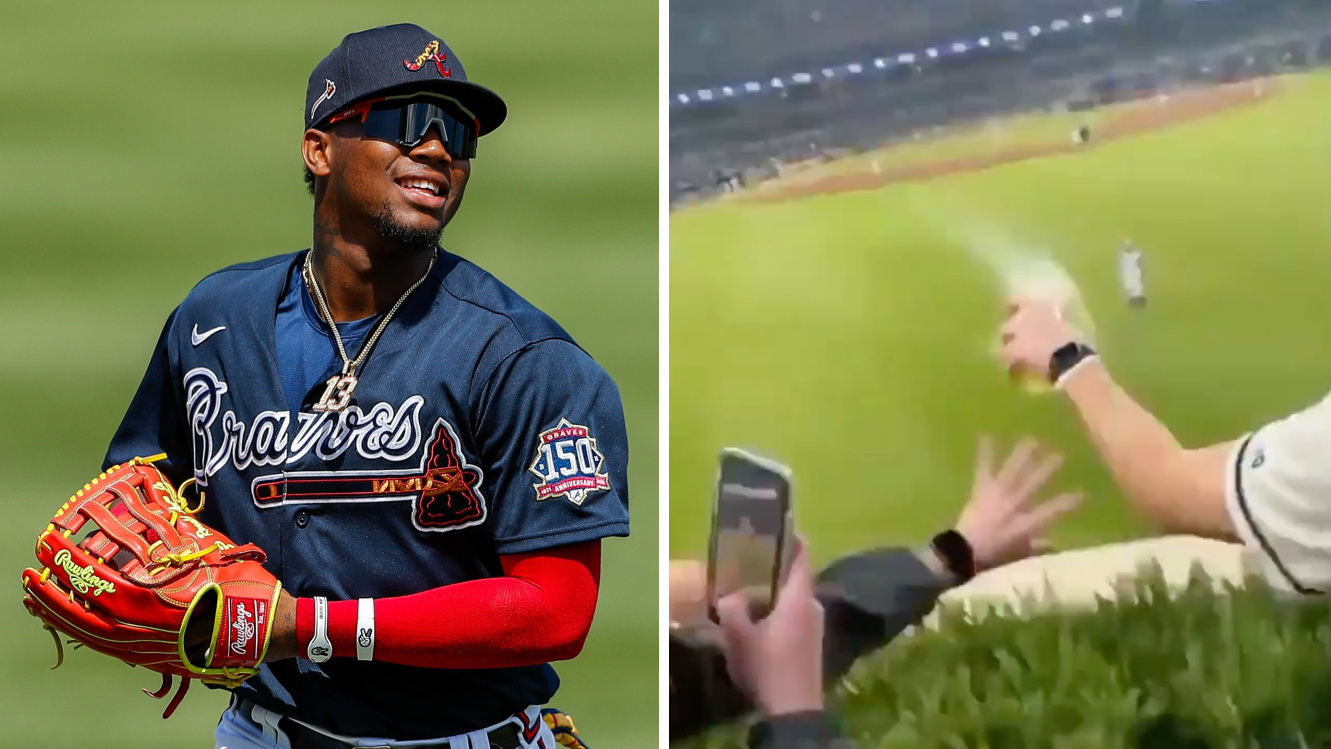 2 fans charged after running onto Coors Field, grabbing Braves outfielder Ronald  Acuña Jr.