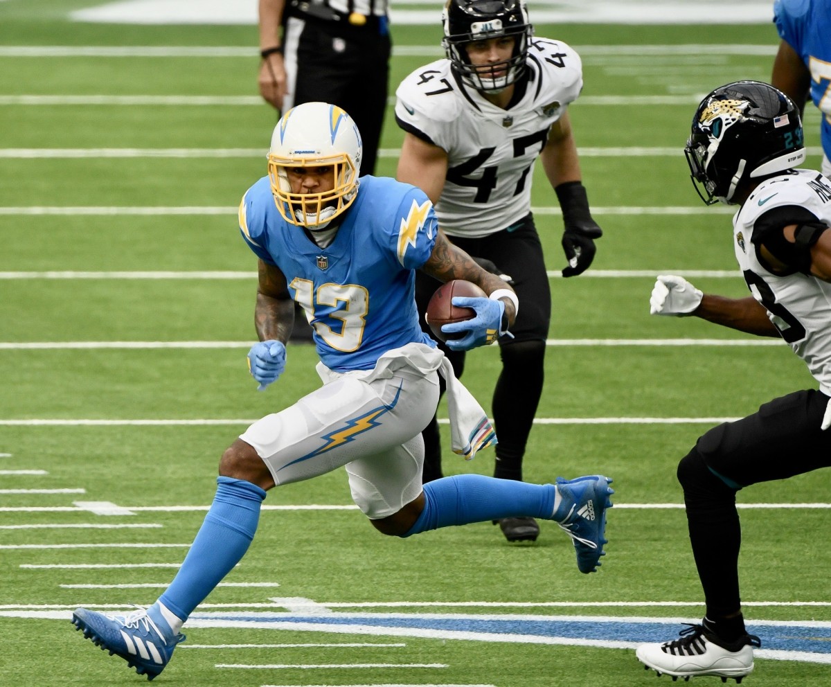 Keenan Allen tries to elude defenders