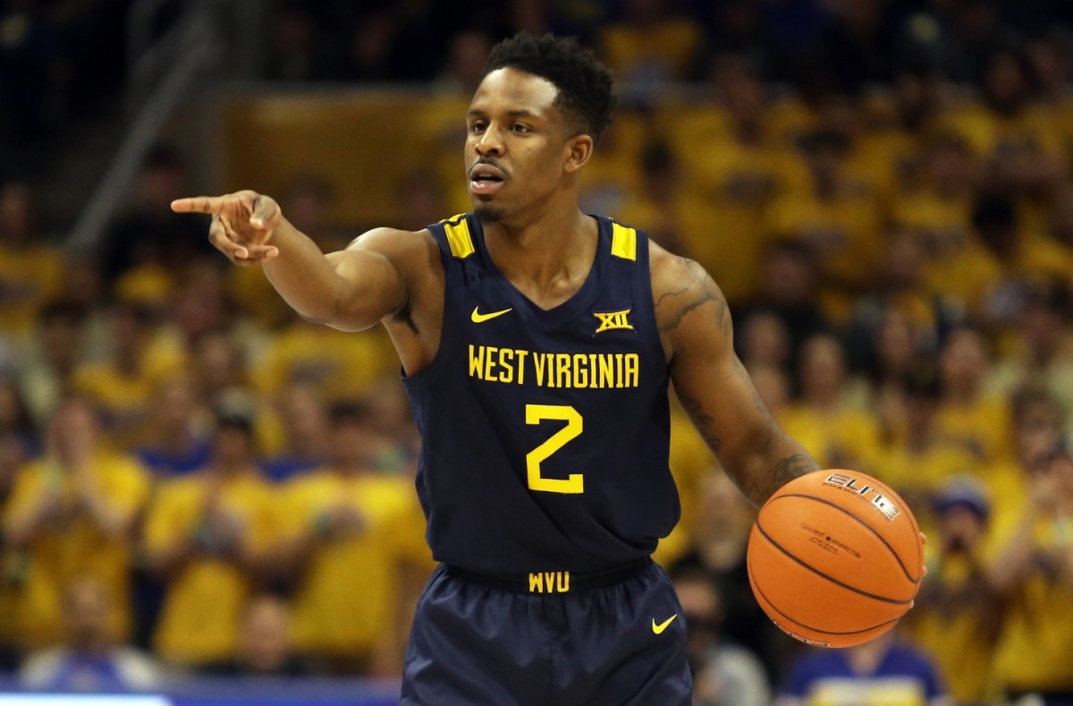 WVU basketball manhandles Cowboys - Page 4