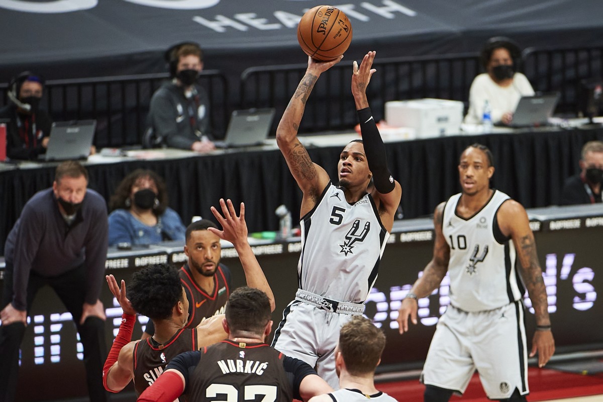 Dejounte Murray takes aim against Portland.