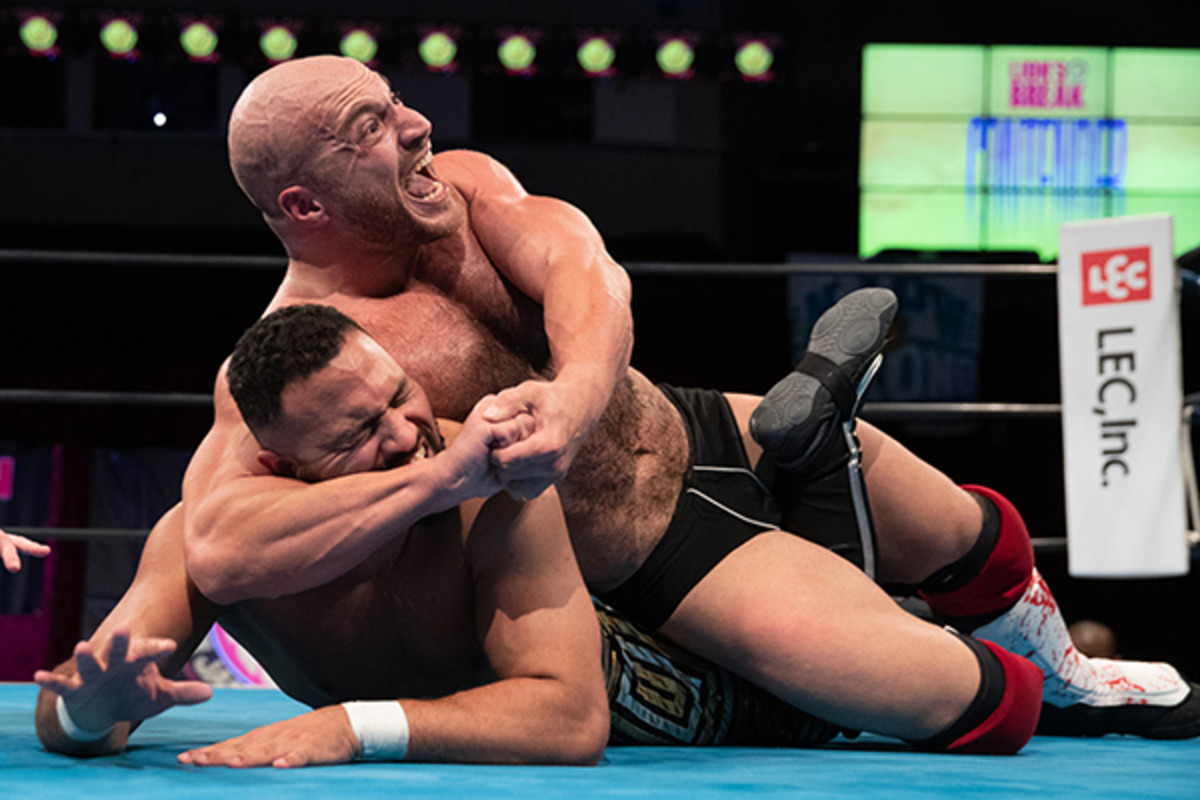 NJPW's Chris Dickinson with his opponent in a headlock