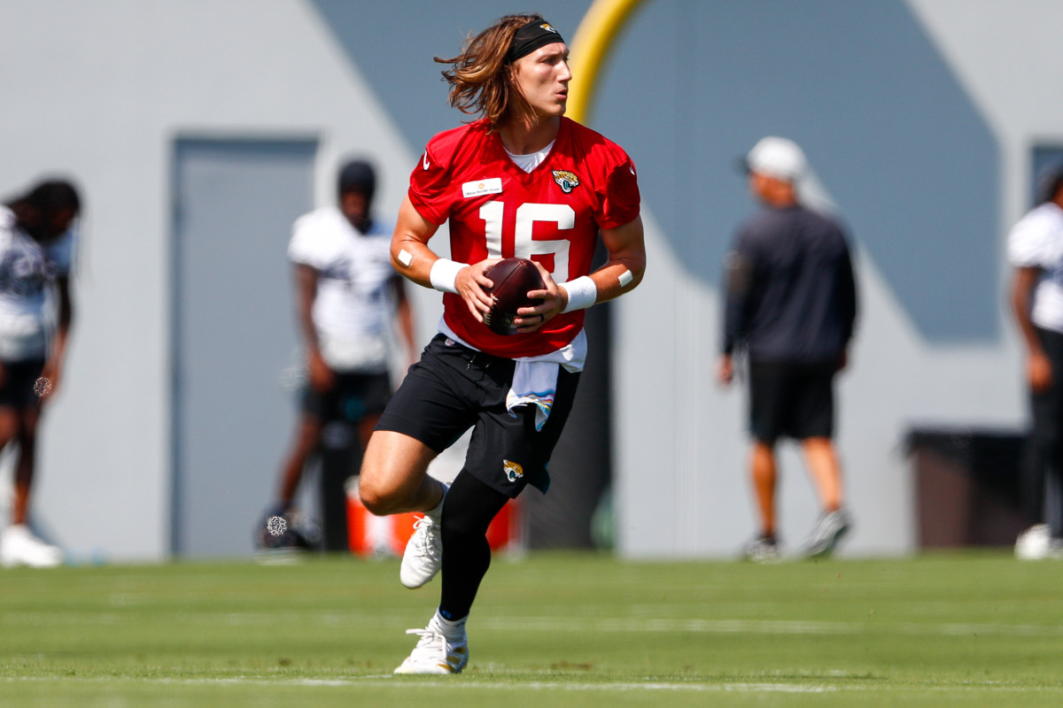 Jun 14, 2021; Jacksonville, Florida, USA; Jacksonville Jaguars quarterback Trevor Lawrence (16) participates in drills during minicamp at Dream Finders Homes practice complex Mandatory Credit: Nathan Ray Seebeck-USA TODAY Sports