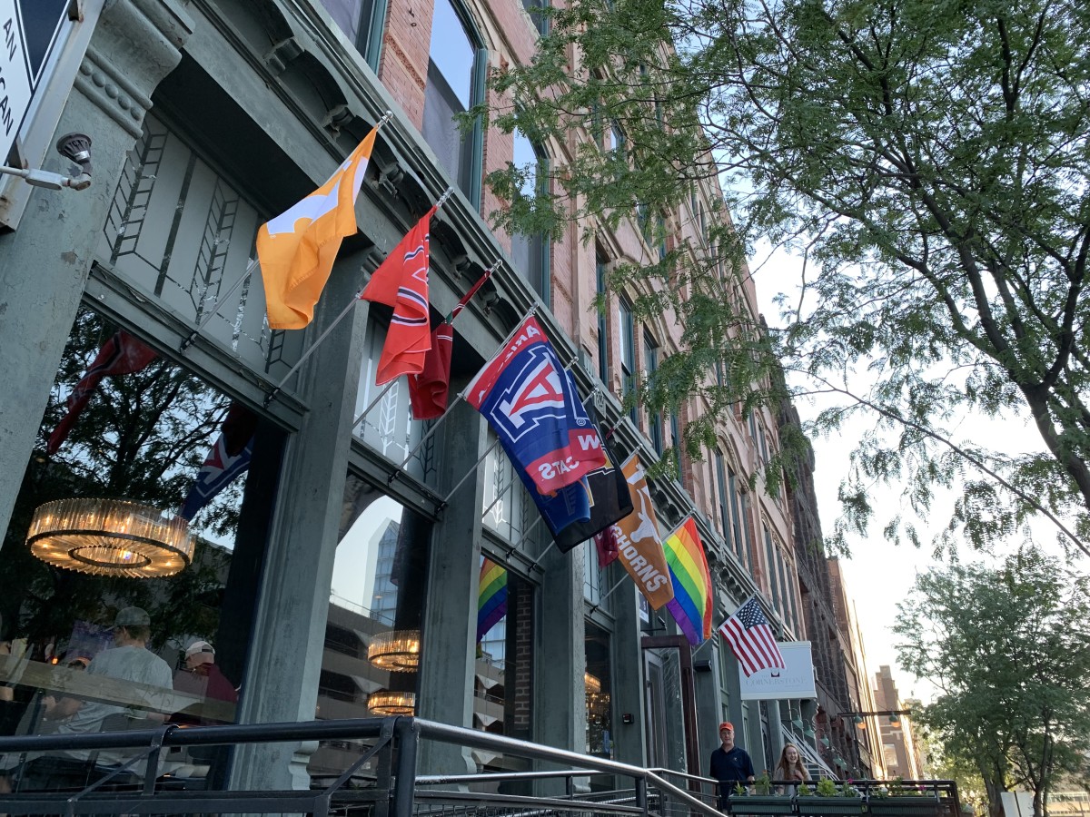 Flags representing each CWS team in Old Market Omaha (Jake Nichols)