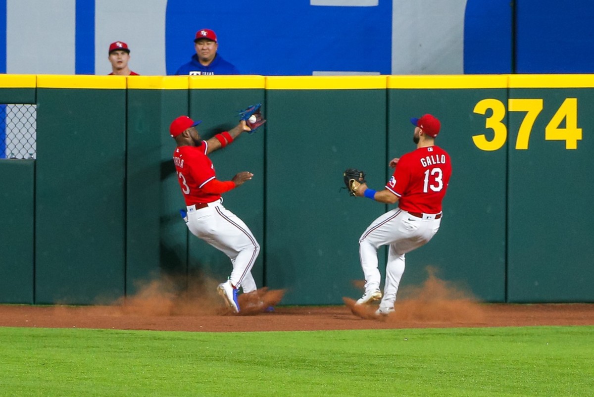 Jun 25, 2021; Arlington, Texas, USA; Texas Rangers center fielder Adolis Garcia (53) tracks down a deep fly ball during the fifth inning against the Kansas City Royals at Globe Life Field.