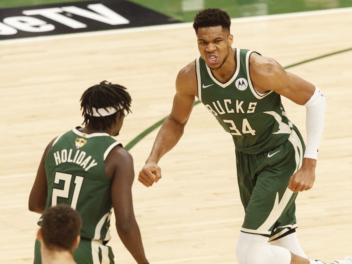 Is Jrue Holiday the key to keeping Giannis Antetokounmpo? - Sports  Illustrated Milwaukee Bucks News, Analysis and More
