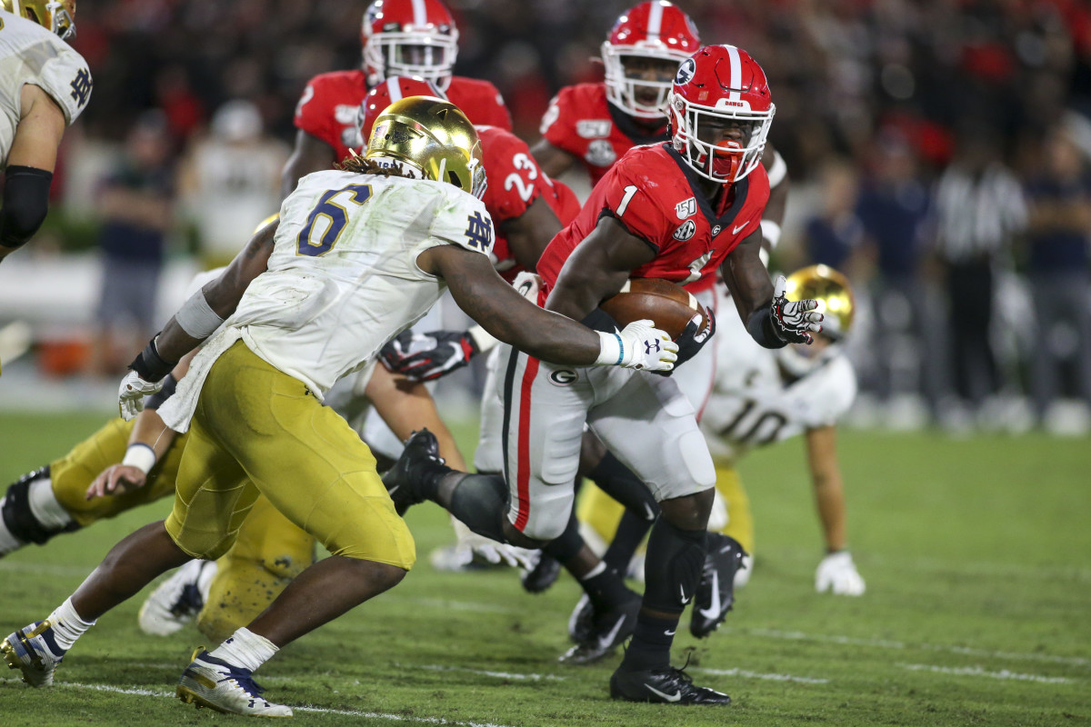 Divaad Wilson running with the football after an interception versus Notre Dame (2019)