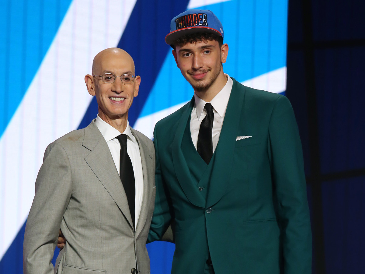 Alperen Sengun (Besiktas, Turkey) poses with NBA commissioner Adam Silver after being selected as the number sixteen overall pick by the Oklahoma City Thunder in the first round of the 2021 NBA Draft