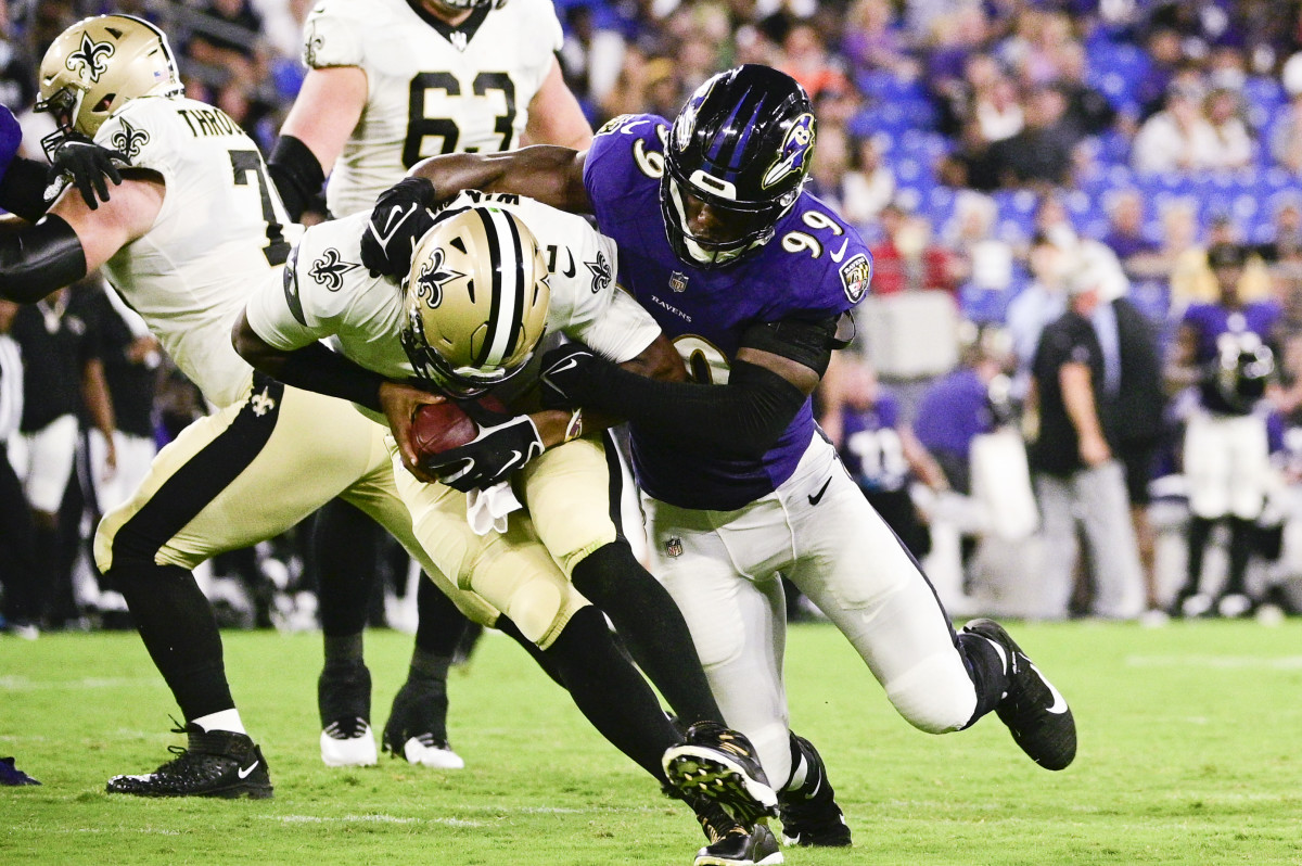 Baltimore Ravens linebacker Odafe Oweh (99) in action during the third  quarter an NFL preseason football game against the New Orleans Saints  Saturday, Aug. 14, 2021, in Baltimore. (AP Photo/Terrance Williams Stock