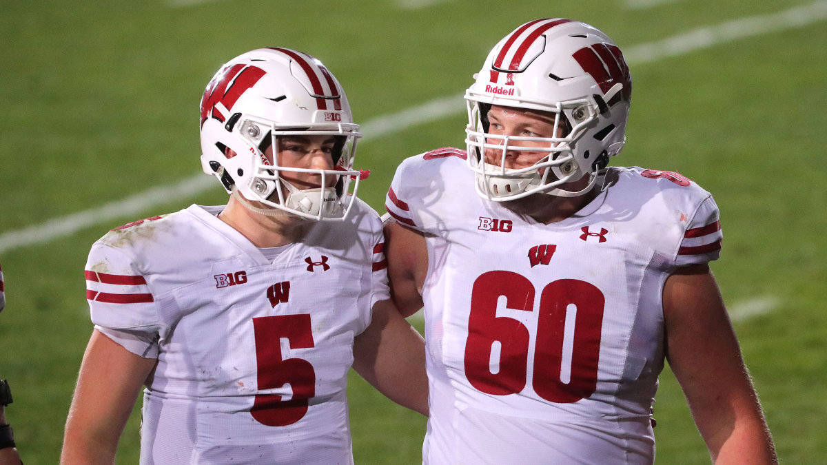 Wisconsin QB Graham Mertz and OL Logan Bruss