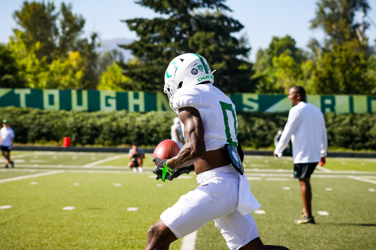 McGee reels in a pass during Oregon fall camp.