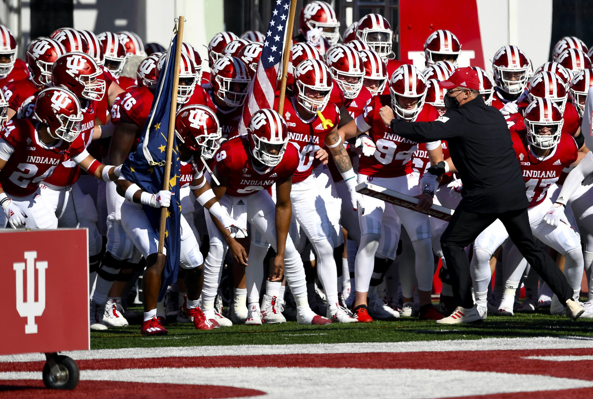 Indiana's Tom Allen leads his team onto the field