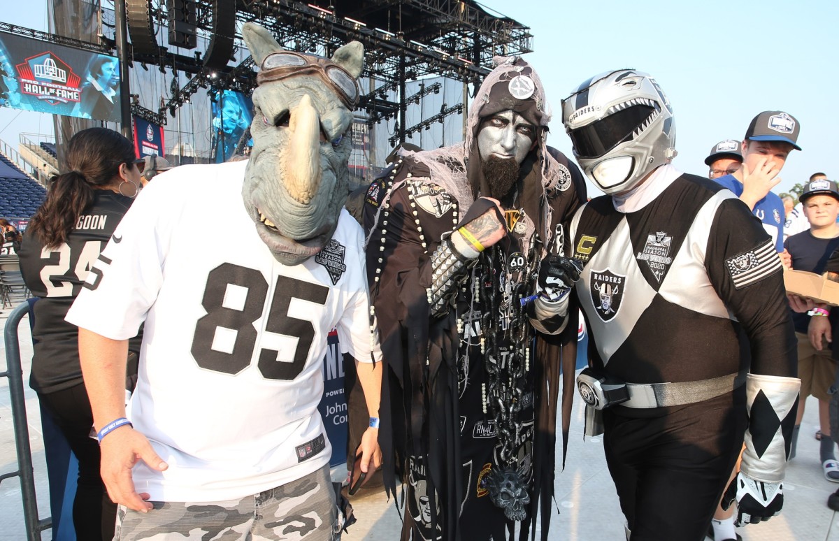 Victor Tayang wears his Oakland Raider gear before the Raiders first game  of the season against …