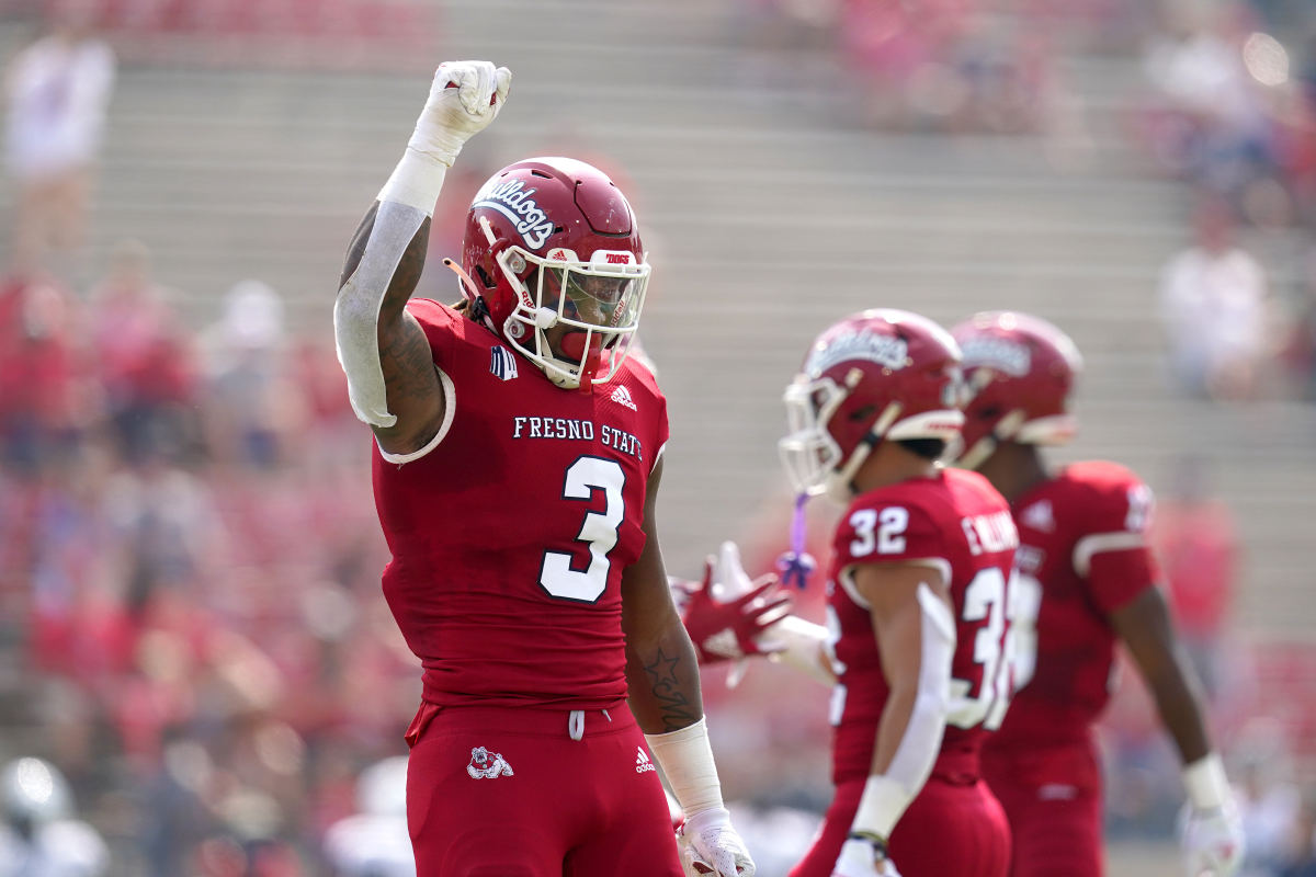 Arron Mosby (3) celebrates a defensive stop against the UConn Huskies on Aug. 28, 2020.