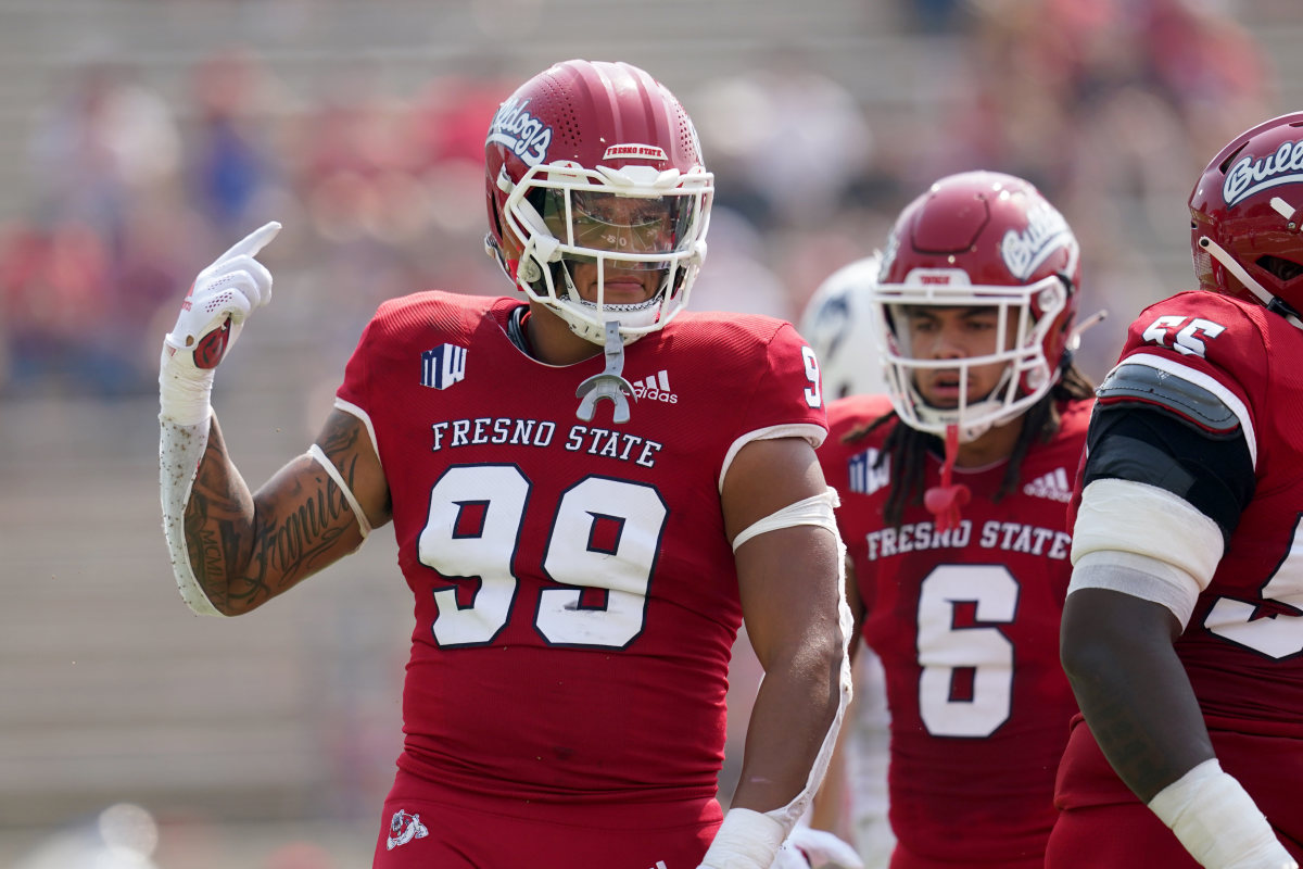 David Perales (99) celebrates a defensive stop against UConn.