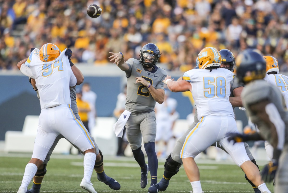 Sep 11, 2021; Morgantown, West Virginia, USA; West Virginia Mountaineers quarterback Jarret Doege (2) throws a pass against the Long Island Sharks during the second quarter at Mountaineer Field at Milan Puskar Stadium.