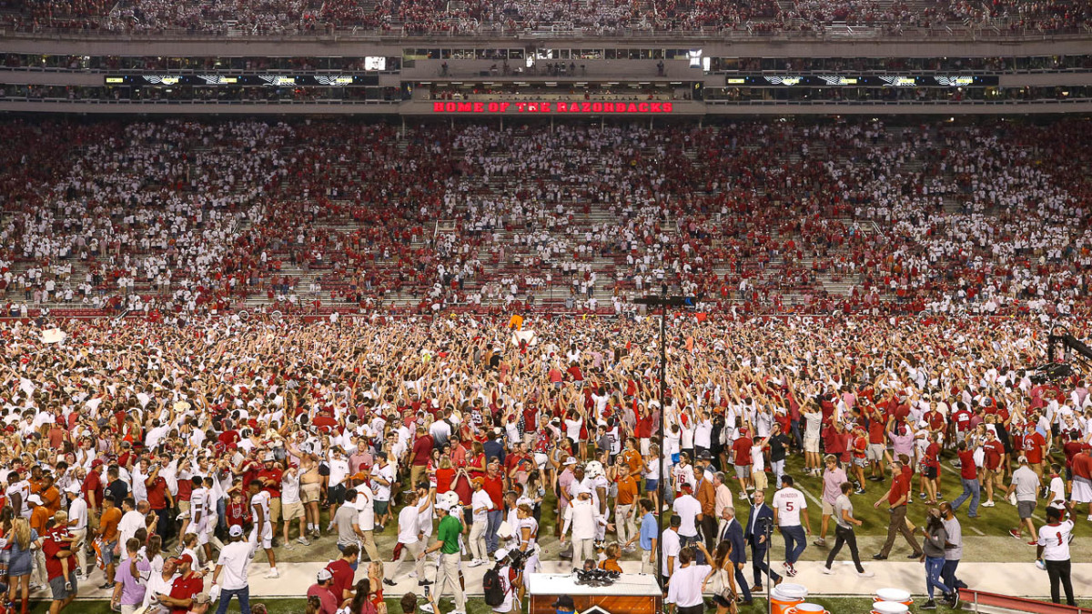 Razorback crowd on field after win over Texas in 2021