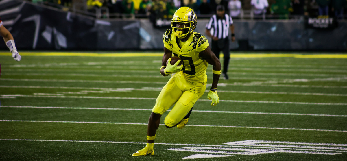 Thornton runs for a touchdown on his first college catch against Stony Brook.