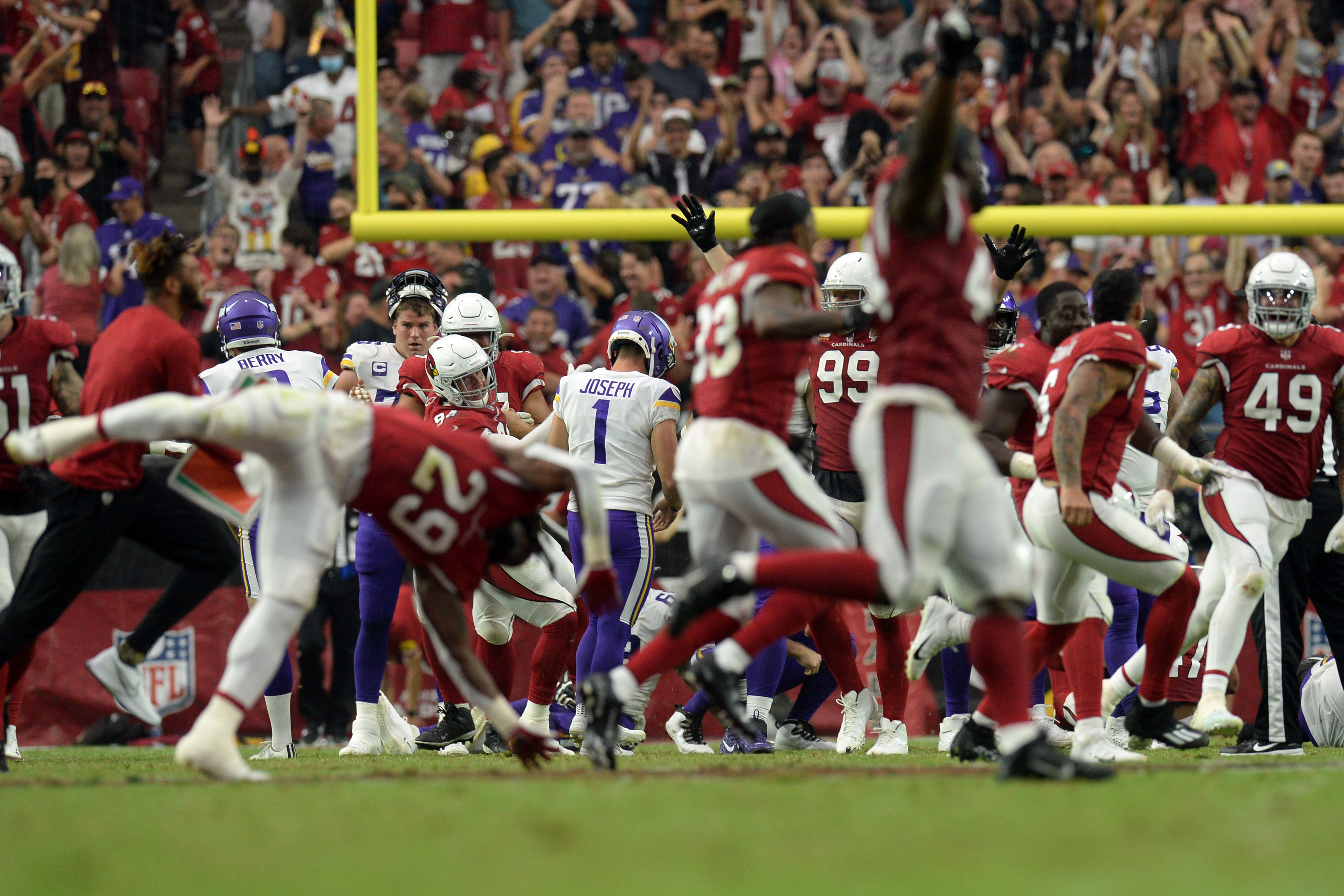 Minnesota Vikings kicker Greg Joseph (1) walks to the sidelines after  missing a game-winning field goal attempt against the Arizona Cardinals  after an NFL football game, Sunday, Sept. 19, 2021, in Glendale