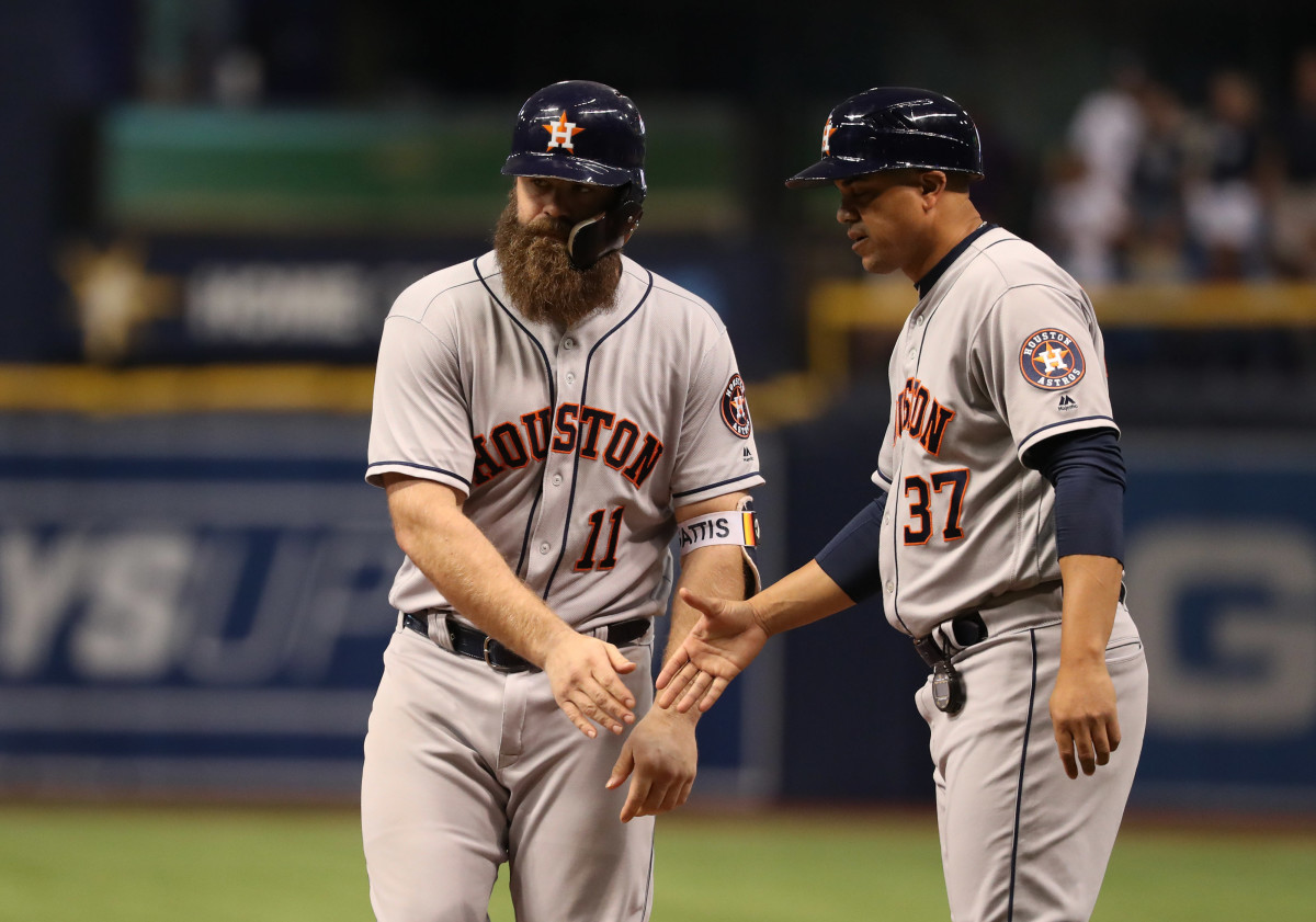 Astros coach Alex Cintrón still chirps at umps, but health scare has calmed  him - The Athletic