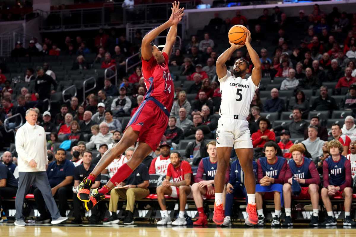 Cincinnati Bearcats guard David DeJulius (5) rises for a shot in the first half of a college basketball game against the N.J.I.T Highlanders, Wednesday, Nov. 30, 2022, at Fifth Third Arena in Cincinnati. N J I T Highlanders At Cincinnati Bearcats Nov 30 0013