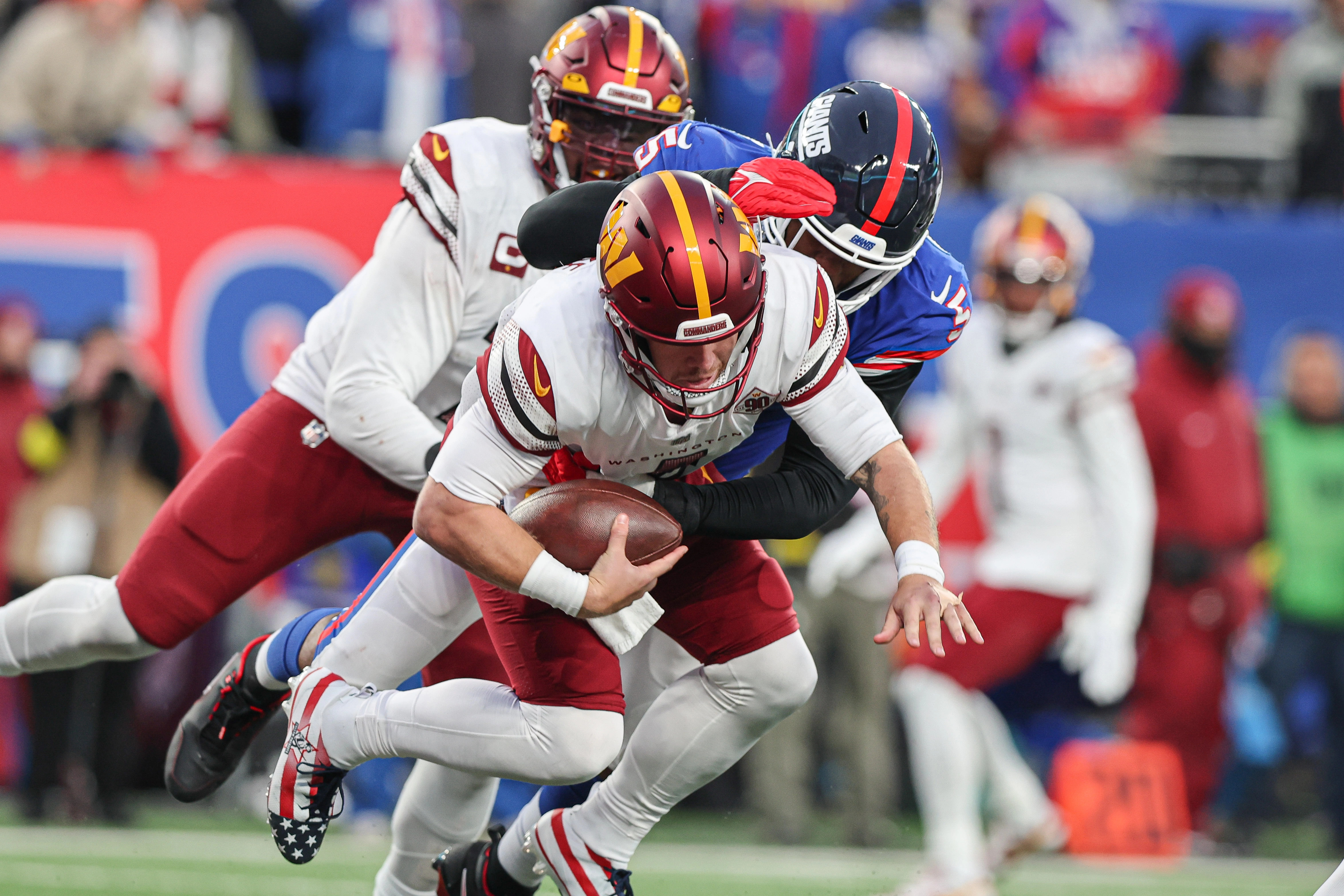 Washington Football Team quarterback Taylor Heinicke (4) warms up before an  NFL football game against the New York Giants on Sunday, Jan. 9, 2022, in  East Rutherford, N.J. (AP Photo/Adam Hunger Stock