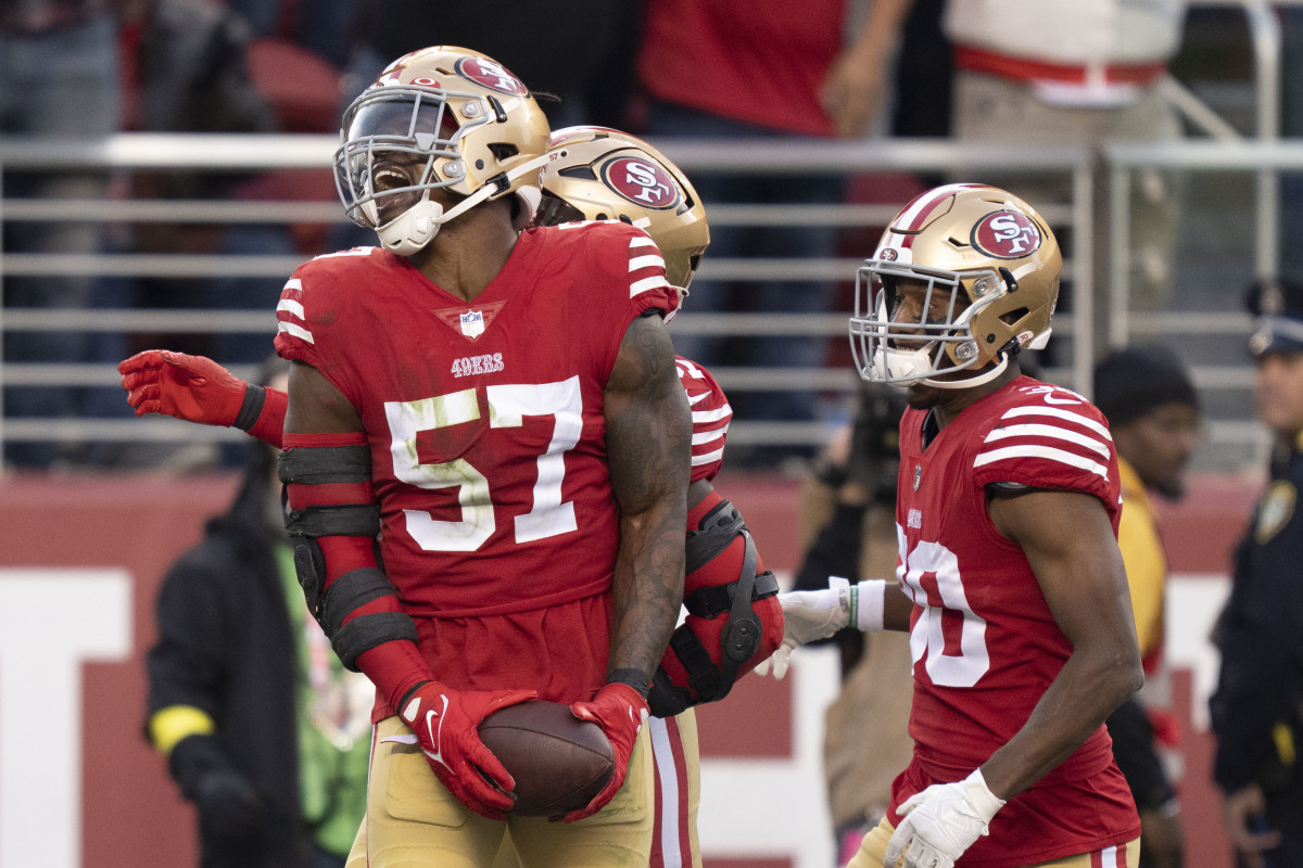 Dre Greenlaw of the San Francisco 49ers on the sideline before the News  Photo - Getty Images