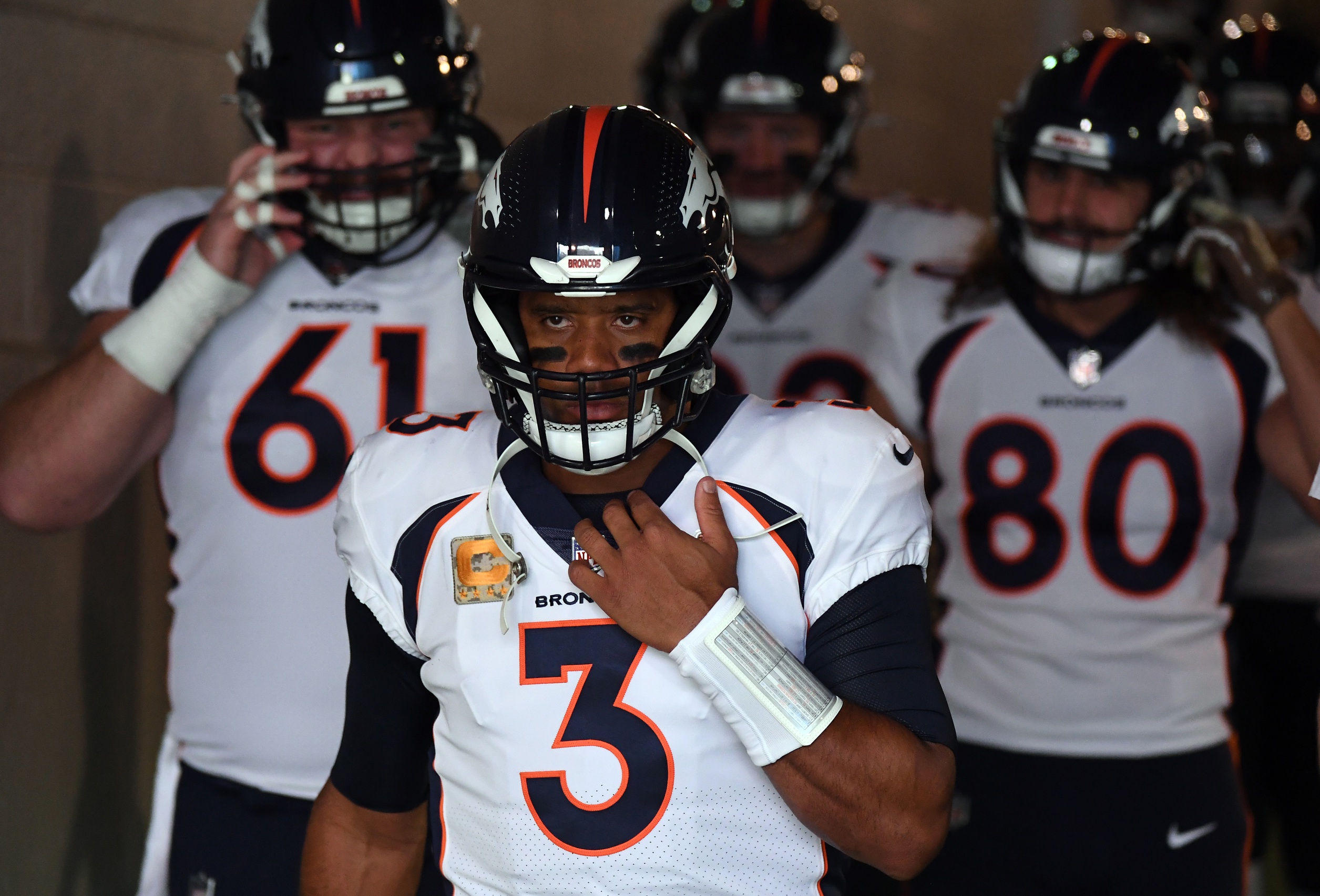 DENVER, CO - DECEMBER 11: Denver Broncos quarterback Russell Wilson (3)  rushes for a 19-yard gain and first down in the second quarter during a  game between the Kansas City Chiefs and