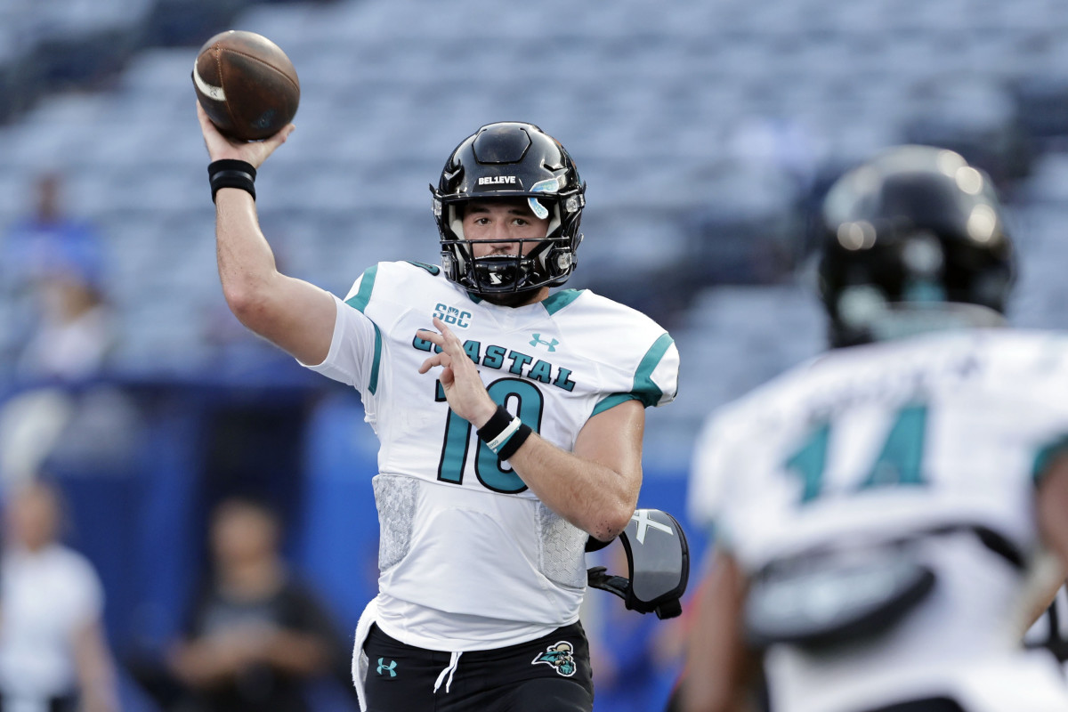 Coastal Carolina quarterback Grayson McCall (10) throws the ball during warms ups prior to an NCAA football game against Georgia State on Thursday, Sept. 22, 2022, in Atlanta. (AP Photo/Stew Milne)