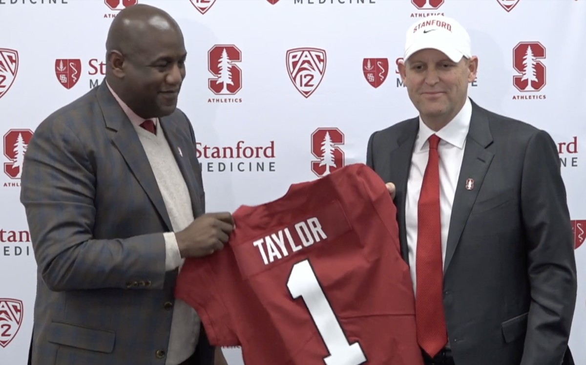 Stanford athletic director Bernard Muir poses with Troy Taylor.
