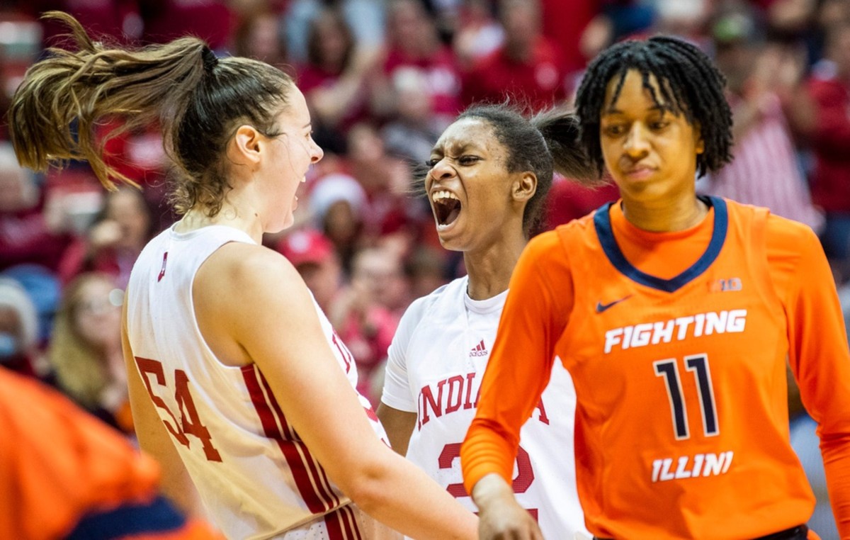 Indiana's Mackenzie Holmes (54) and Chloe Moore-McNeil (22) celebrate Holmes basket and a foul during the second half of the Indiana versus Illinois women's basketball game at Simon Skjodt Assembly Hall on Sunday, Dec. 4, 2022.