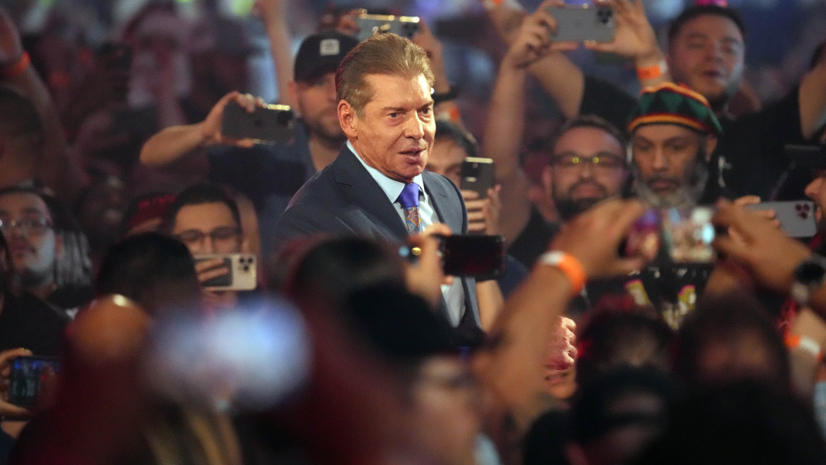 Vince McMahon walks to the ring at WrestleMania