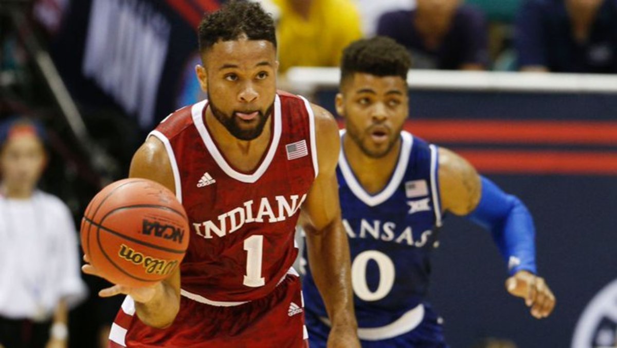 Indiana guard James Blackmon Jr. (1) passes the ball with Kansas' Frank Mason guarding him on Nov. 11, 2016. Indiana defeated Kansas 103-99 in overtime in the Armed Forces Classic in Honolulu, Hawaii.