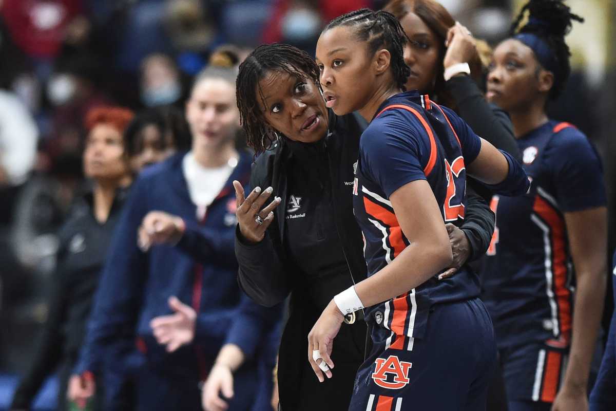 Auburn basketball coach Johnnie Harris talks with Auburn guard Honesty Scott-Grayson (23) during the SEC Women's Basketball Tournament game against Alabama in Nashville, Tenn. on Wednesday, March 2, 2022. Auburn Alabama Sec