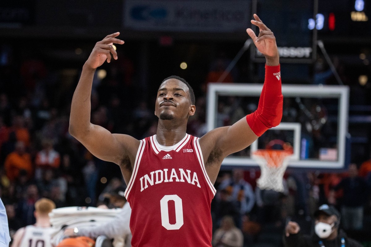 Xavier Johnson celebrates with Indiana fans in the closing minutes of the win over Illinois in the Big Ten Tournament. (USA TODAY Sports)