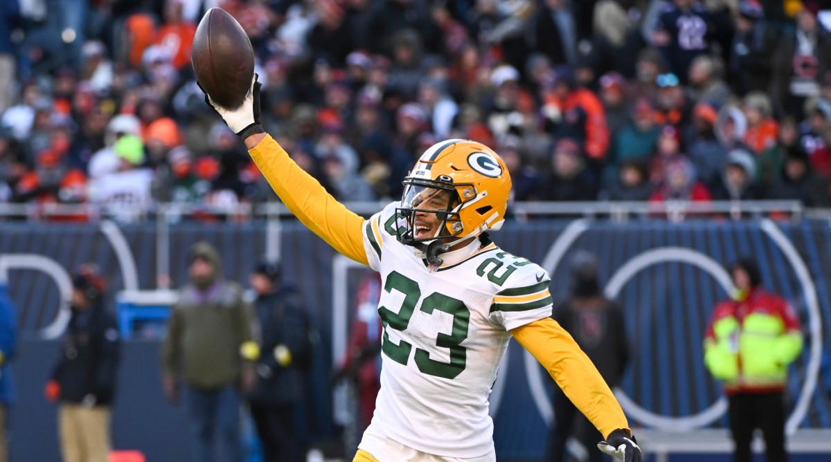 Packers cornerback Jaire Alexander (23) celebrates after making an interception during a game against the Bears.