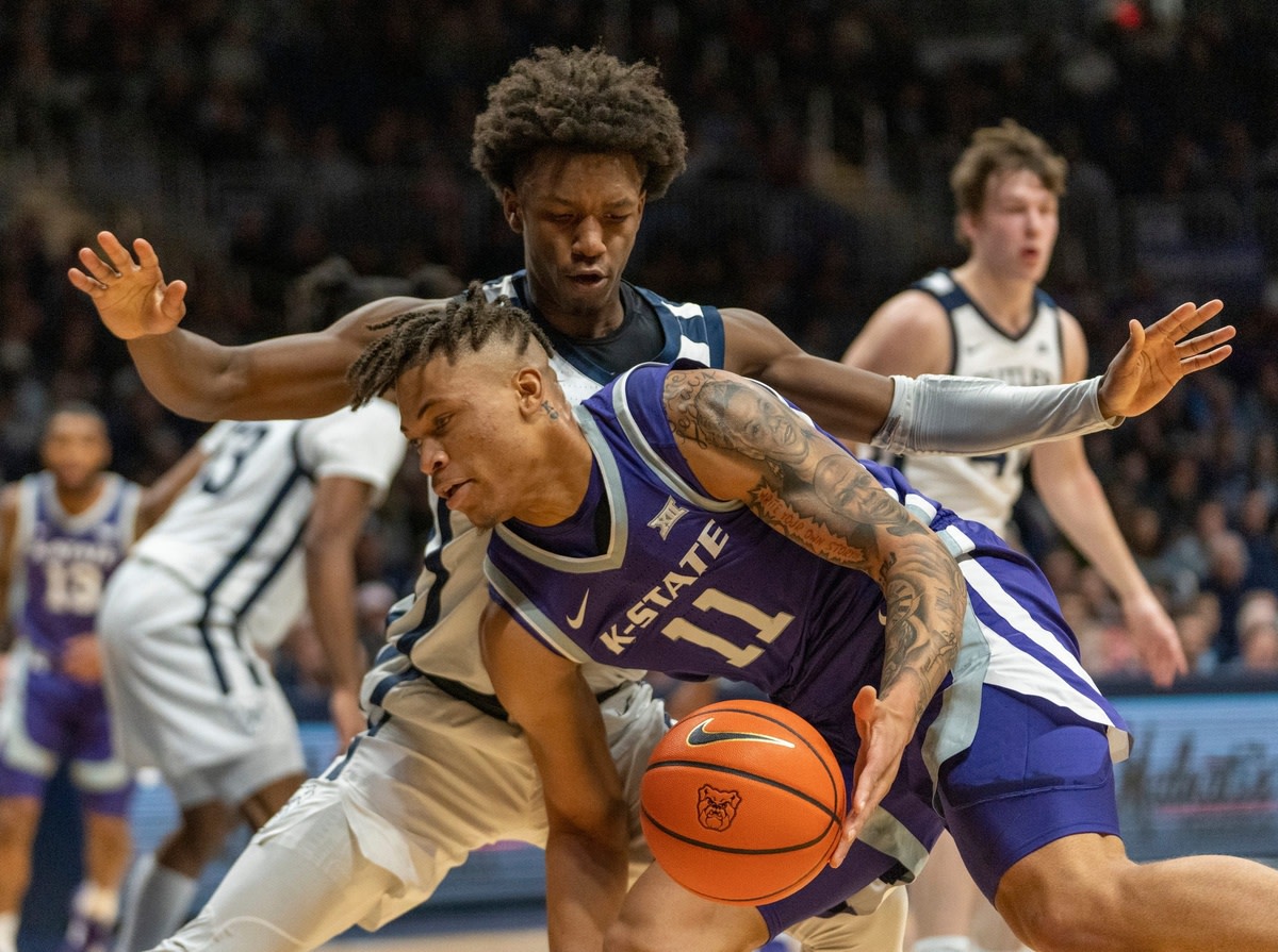 Kansas State Wildcats forward Keyontae Johnson (11) is defended by Butler Bulldogs guard Chuck Harris (3) at Hinkle Fieldhouse, Wednesday, Nov. 30, 2022, during Butler s 76-64 win over Kansas State.