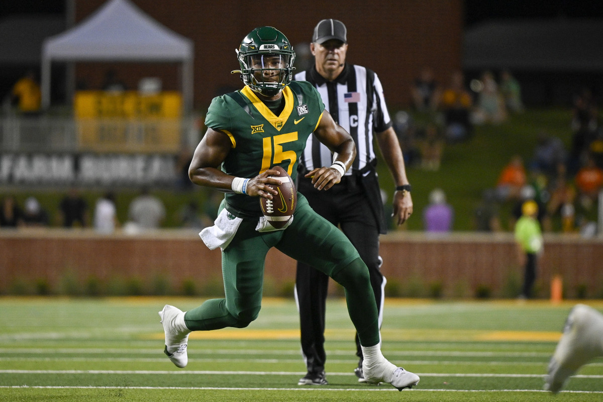 Baylor Bears quarterback Kyron Drones (15) scores a touchdown against the Albany Great Danes during the second half at McLane Stadium.