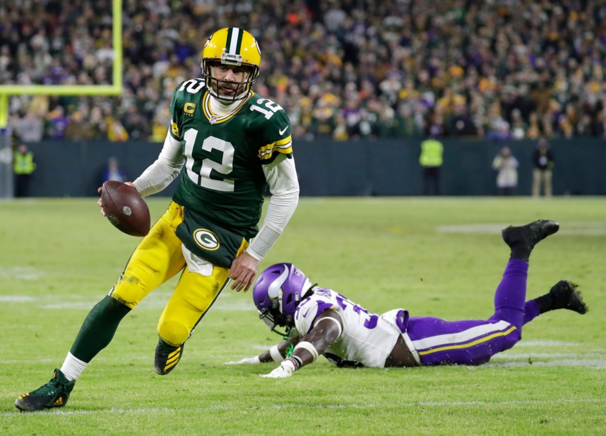 Green Bay Packers' Aaron Rodgers talks to Cleveland Browns' Baker Mayfield  after an NFL football game Saturday, Dec. 25, 2021, in Green Bay, Wis. The  Packers won 24-22. (AP Photo/Matt Ludtke Stock