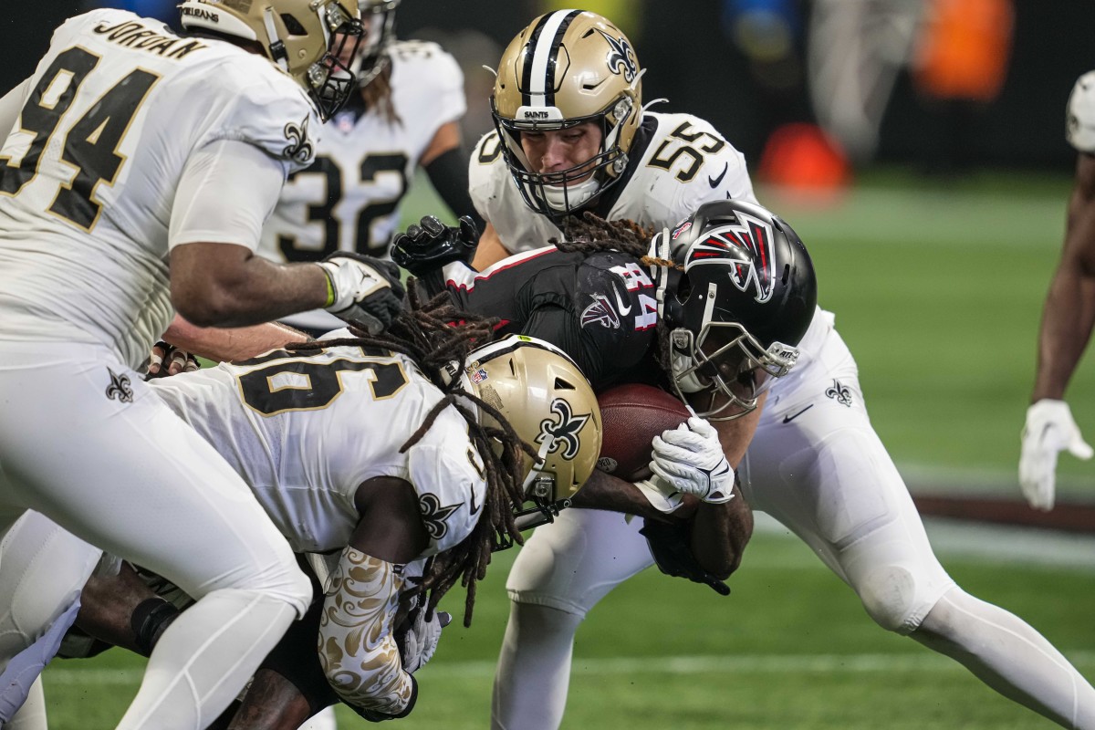 NFC running back Mark Ingram, right, of the New Orleans Saints, and  linebacker Thomas Davis Sr., of the Carolina Panthers, wrestle during Pro  Bowl NFL football practice, Wednesday, Jan. 24, 2018, in