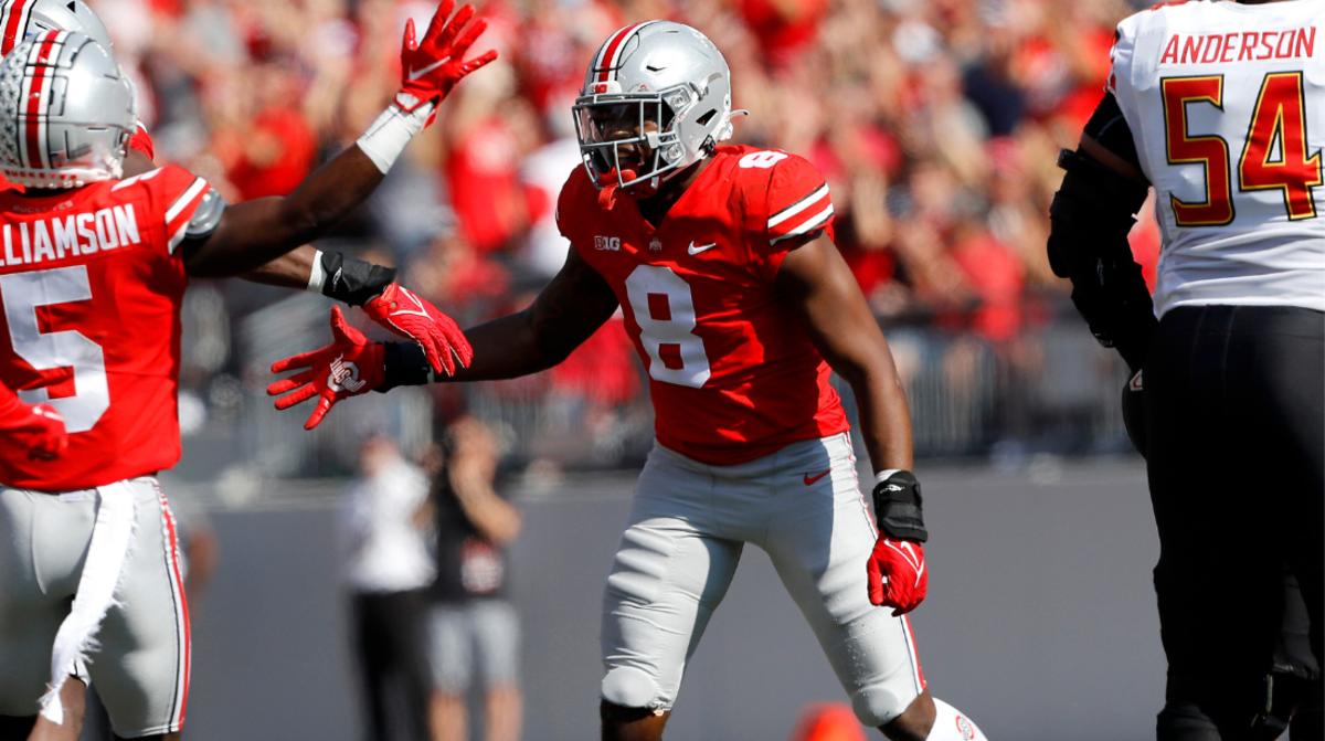 USA. 23rd Sep, 2023. September 23, 2023: Ohio State running back TreVeyon  Henderson (32) runs with the ball as Notre Dame defensive lineman Javontae  Jean-Baptiste (1) pursues during NCAA football game action