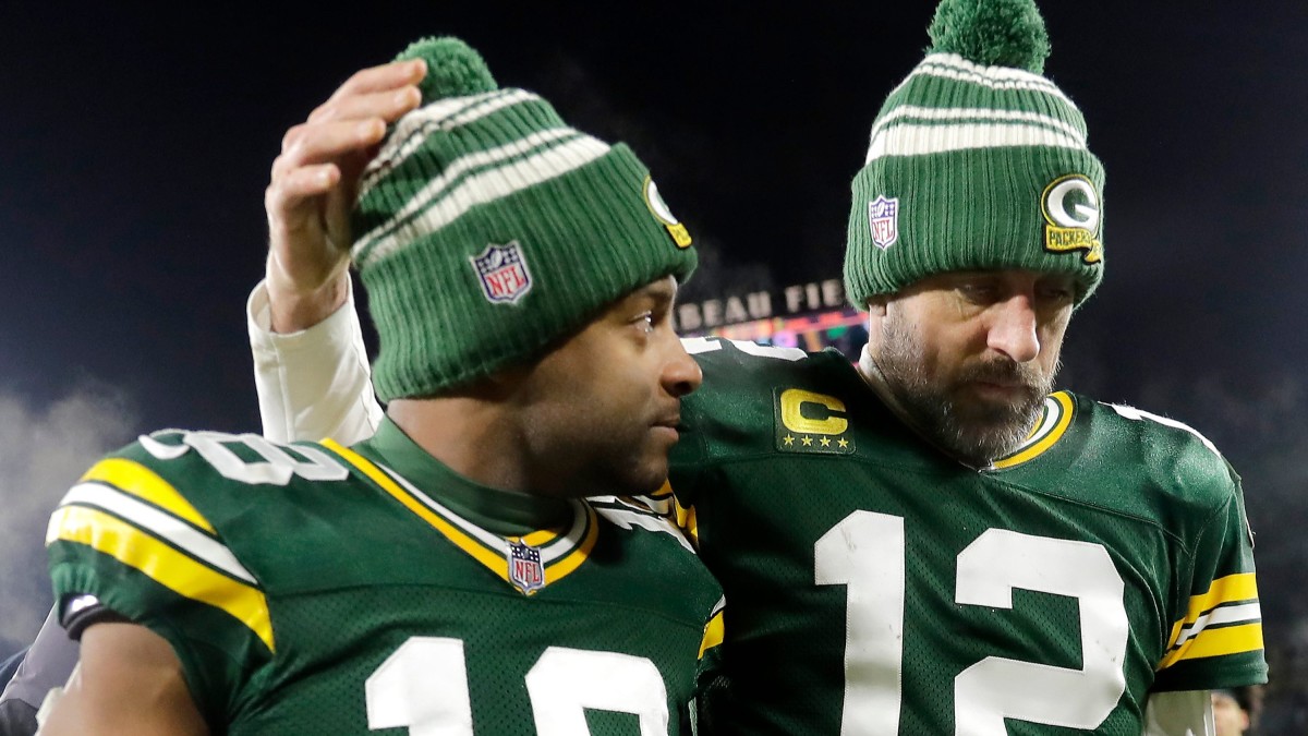 November 28, 2021: Green Bay Packers quarterback Aaron Rodgers (12) warming  up during the NFL football game between the Los Angeles Rams and the Green  Bay Packers at Lambeau Field in Green