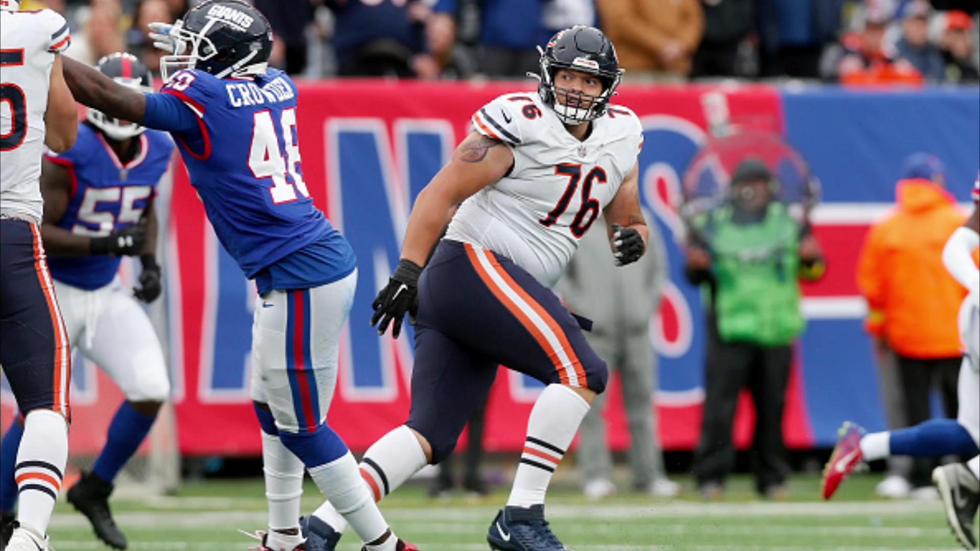 Chicago Bears offensive tackle Teven Jenkins (76) runs off the field after  an NFL football game