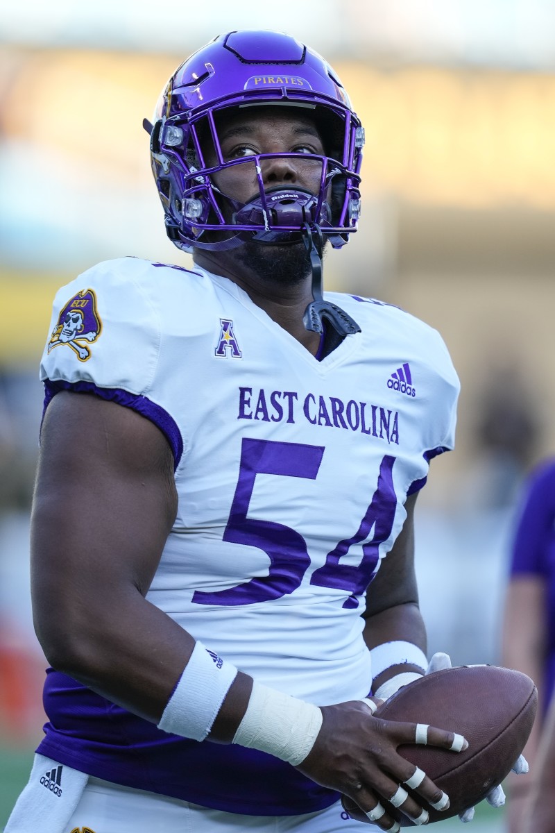 Sep 2, 2021; Charlotte, North Carolina, USA; East Carolina Pirates offensive lineman Avery Jones (54) during pregame action against the Appalachian State Mountaineers at Bank of America Stadium. Mandatory Credit: Jim Dedmon-USA TODAY Sports