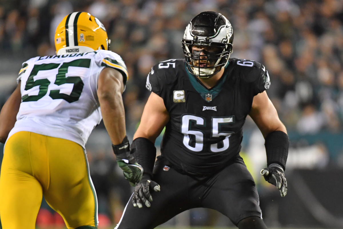 Nov 27, 2022; Philadelphia, Pennsylvania, USA; Philadelphia Eagles offensive tackle Lane Johnson (65) prepare to block Green Bay Packers linebacker Kingsley Enagbare (55) at Lincoln Financial Field.