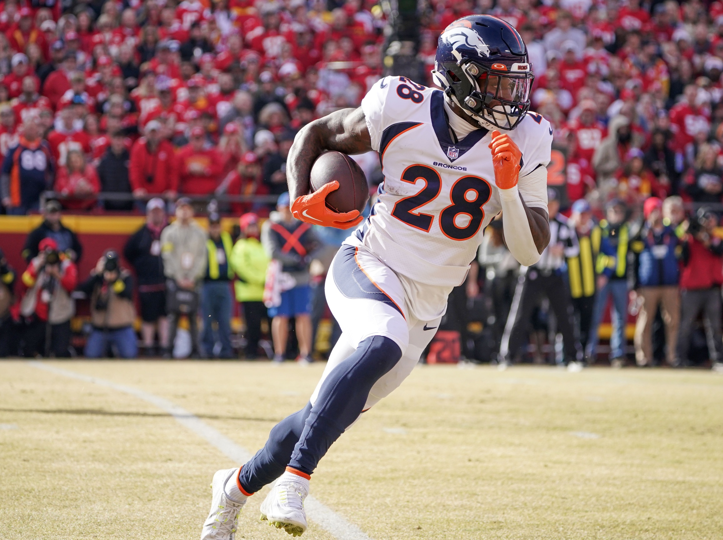 Denver Broncos running back Latavius Murray (28) walks on the sidelines  before the second half of an NFL football game against the Tennessee Titans  Sunday, Nov. 13, 2022, in Nashville, Tenn. (AP