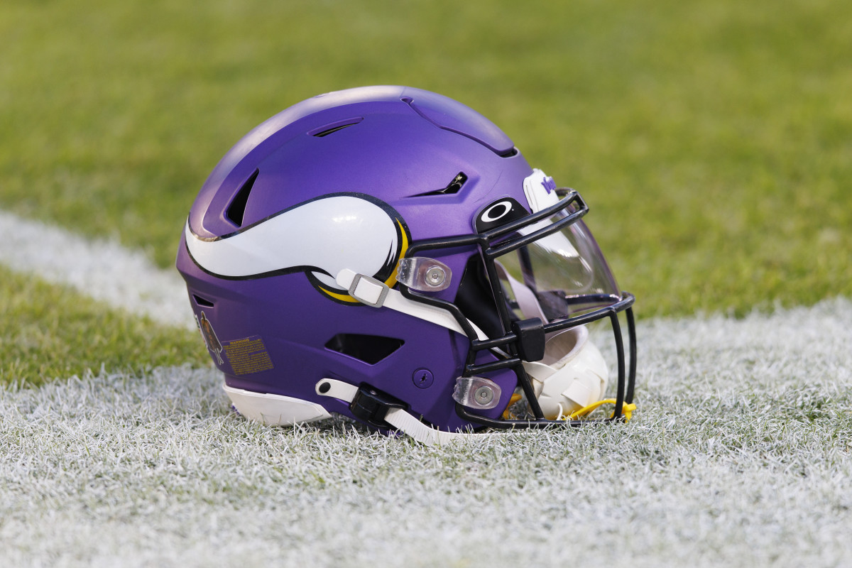 Green Bay, Wisconsin, USA; A Minnesota Vikings helmet sits on the field during warmups prior to the game against the Green Bay Packers at Lambeau Field.